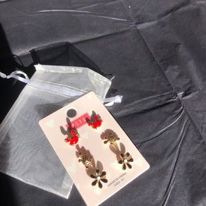 small earrings and long bracelets for luck